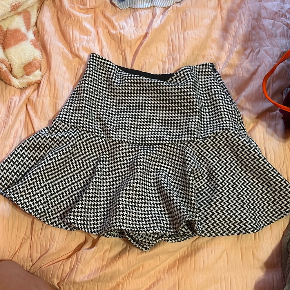 A white and black skirt worn 2 times